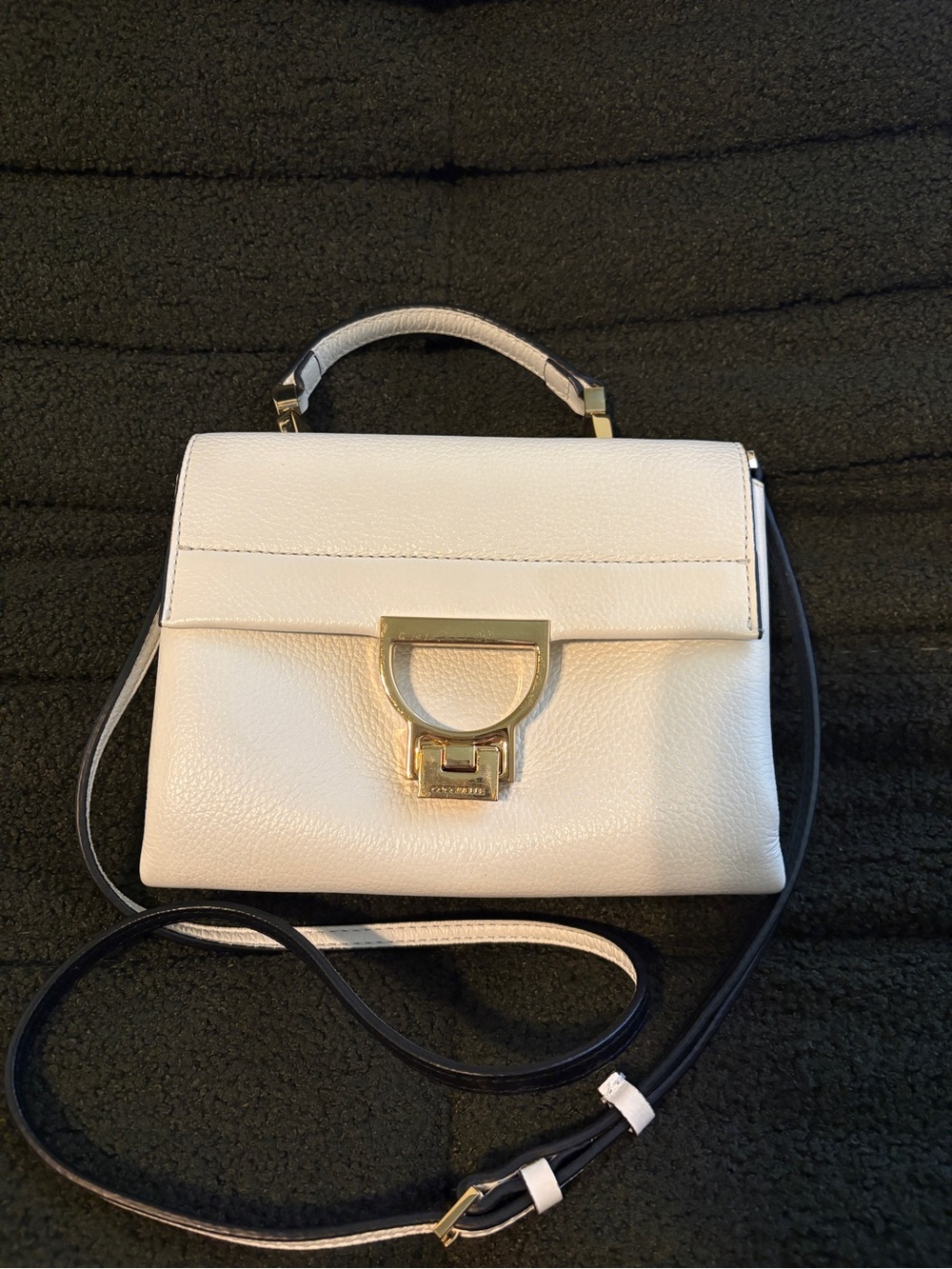 Coccinelle Arlettis Small
Leather Top Handle Crossbody
Clutch Bag White Gold